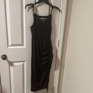 Elegant Black Dress with Gold Accents